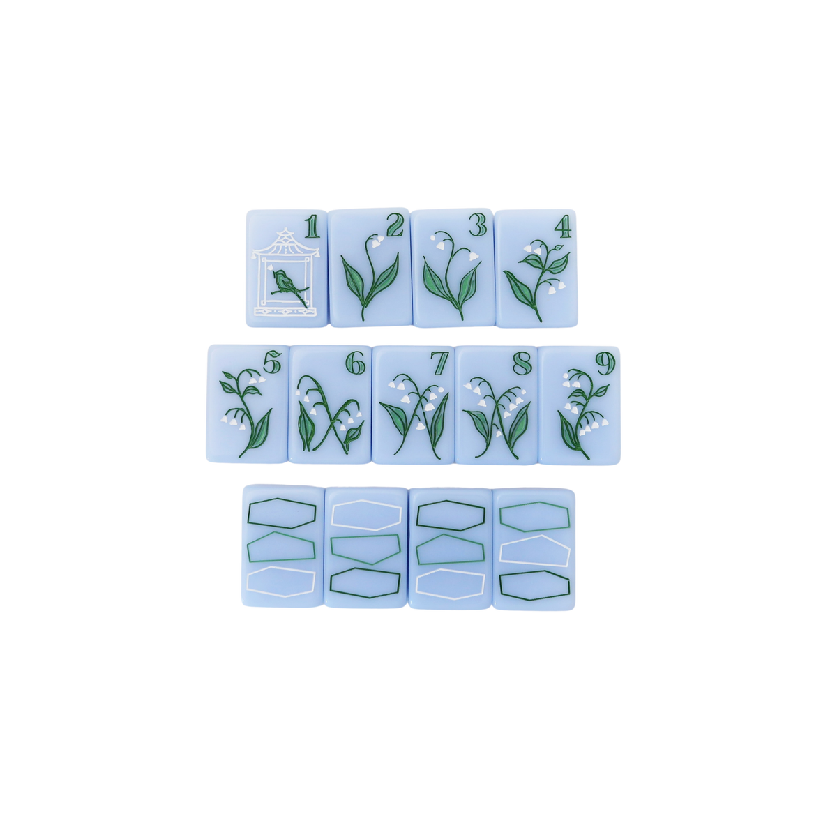 Kayce Hughes mahjong tiles close-up: bam suit 1 through 9 with lily of the valley botanical artwork on soft blue acrylic, with dragon tiles below