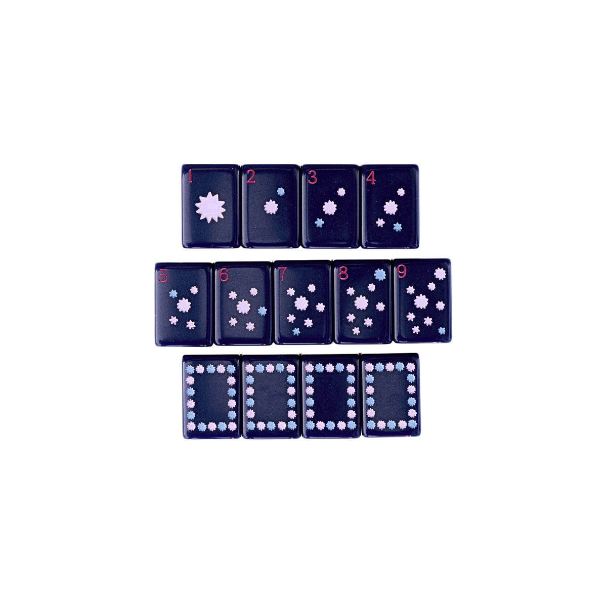 Close-up of hand-painted dot suit tiles and soap dragons from the Dear Mahjong Original Navy mahjong set