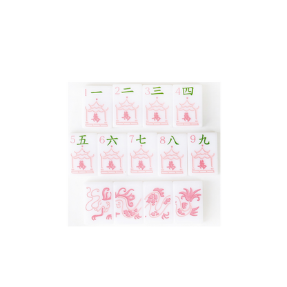 Close-up of hand-painted crak suit tiles and red dragons from the Dear Mahjong Original White mahjong set